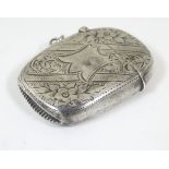 A Victorian silver vesta case with engraved decoration.