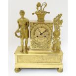 An early 19thC French ormolu cased mantle clock with 8 day movement, having silk suspension,