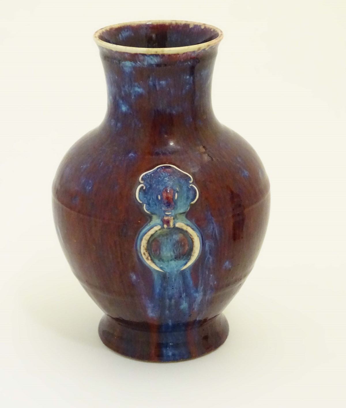 A Chinese high fired, sang de boeuf baluster vase with ring handle decoration. - Image 5 of 6