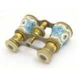 A pair of adjustable opera glasses by 'Lemaire, Paris' with enamel decoration,