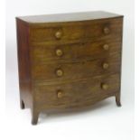 A mid 19thC mahogany bow fronted chest of drawers with reeded mouldings to the top edge,