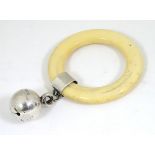 A baby's rattle with teething ring and silver bell hallmarked Chester c.