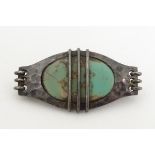 Murrle Bennett & Co : A silver Arts and Crafts / Art Nouveau / Jugendstil brooch with hammered