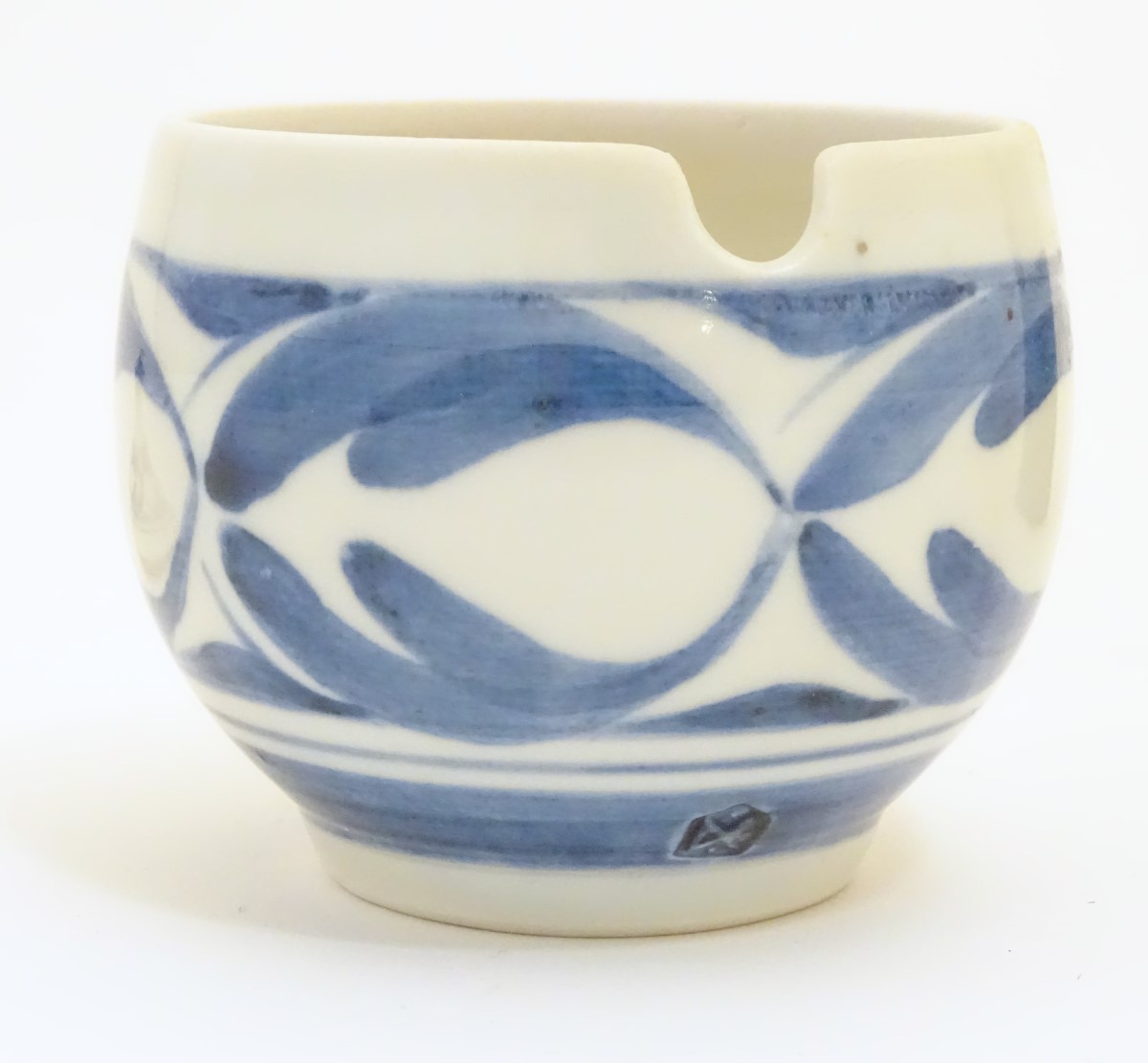 A Derek Emms studio pottery lidded preserve pot, with blue and white stylised foliage decoration. - Image 2 of 7