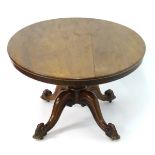 A late 19thC mahogany tilt top table,