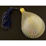 Glass shell scent bottle: an iridescent scallop shell scent bottle with turned brass screw lid,