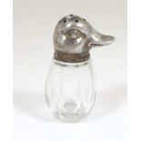 A novelty pepperette with glass body formed with silver top formed as a duck marked 935? maker