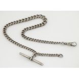 A hallmarked silver pocket watch chain of graduated curblink form with T-bar.