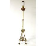 A 19thC brass with some copper telescopic floor standing standard lamp,