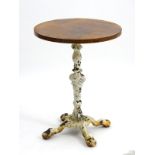 Pub table : a Victorian cast iron pedestal table, the base with remains of painted finish,