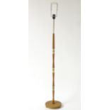 Vintage Retro: A Danish (Scandi) telescopic standard lamp with a teak and brass column on an
