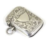 A silver vesta case with engraved decoration.