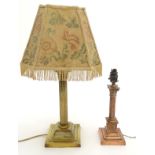 Two electric table lamps, one brass with a shade and the other copper,