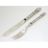 A silver handle fish knife and fork hallmarked Birmingham 1906 CONDITION: Please