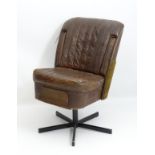 A mid / late 20thC leather car seat converted into a swivel office chair.