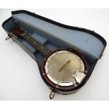 Musical Instruments: Early to mid 20thC Banjolele/Banjolin in its original case.