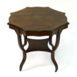 An early 20thC rosewood table with an octagonal shaped top decorated with marquetry and banding to