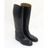 A pair of French black riding boots,