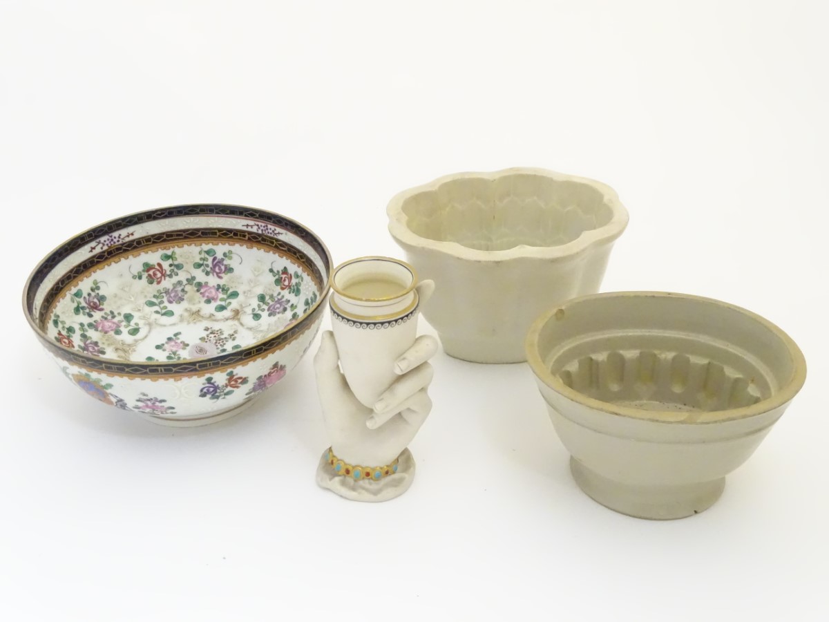 A quantity of ceramic items to include a Worcester vase formed as hand holding a Grecian urn,