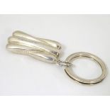 A silver key ring hallmarked Sheffield 1999 maker CCP.