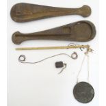 A set of opium scales with a bone (graduated) shaft, brass pan in a wooden case.