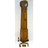 A continental 19thC cherry wood longcase clock (case only), with lenticel glass and a long door,