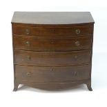 A mid 19thC mahogany bow fronted chest of drawers comprising four long graduated drawers,