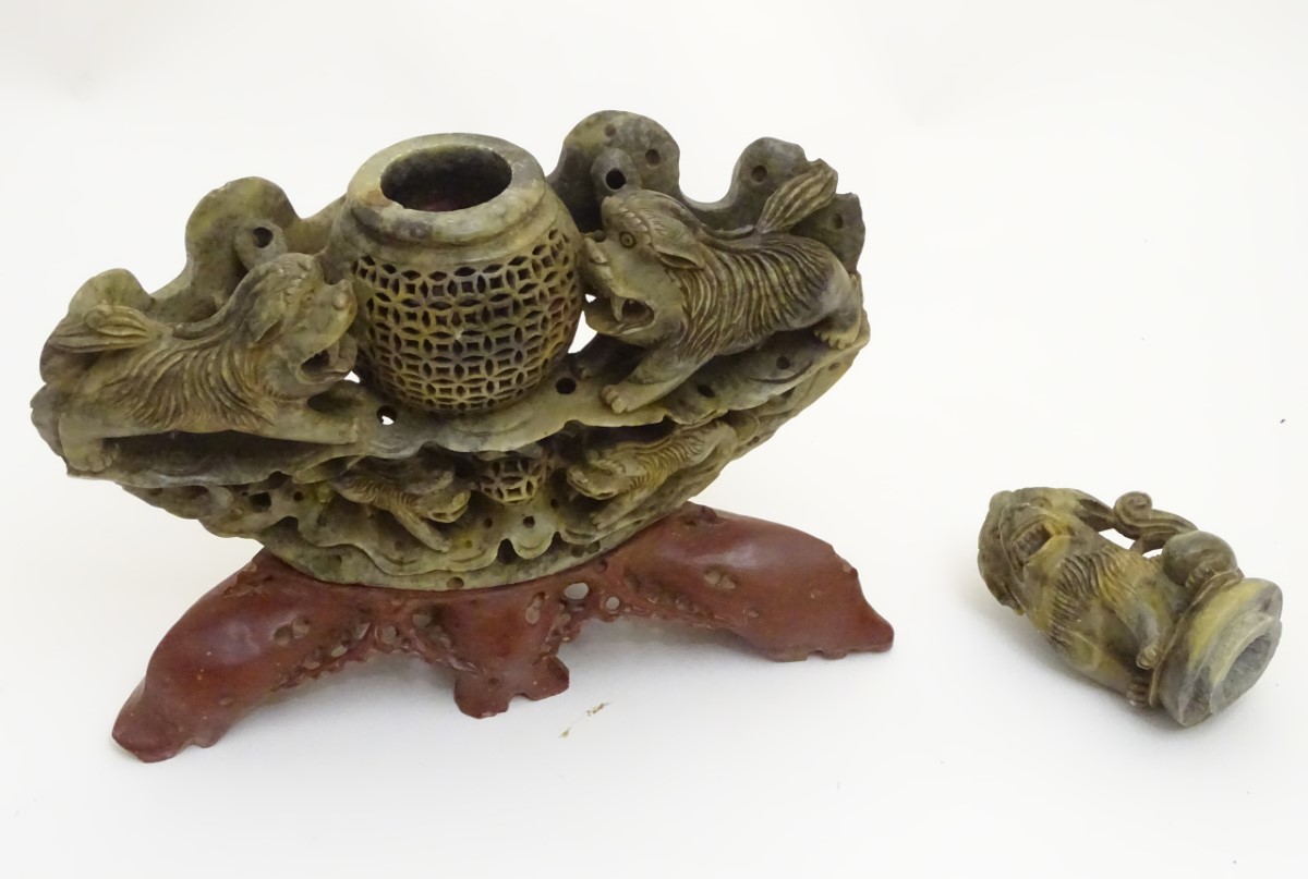 A 19thC Asian carved soapstone reticulated lidded bowl, flanked by foo dogs, - Image 3 of 6