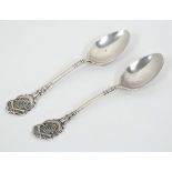 Shooting Interest : A pair of silver teaspoons with crossed rifle and target decoration to top.