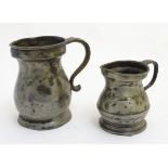 Pewter: A 1 pint baluster tankard with portcullis stamp together with a 1/2 pint baluster shaped
