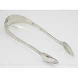 Dutch silver sugar tongs approx 5 ¼” long.