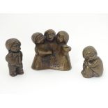 A set of solid bronze cast Christmas figures, formed as children - three as choristers,