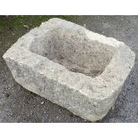 An 18/19thC limestone trough.