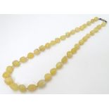 A Vintage necklace of graduated hardstone quartz beads 24” long CONDITION: Please