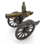 Militaria: A desk top model of a Gatling gun, of cast construction.