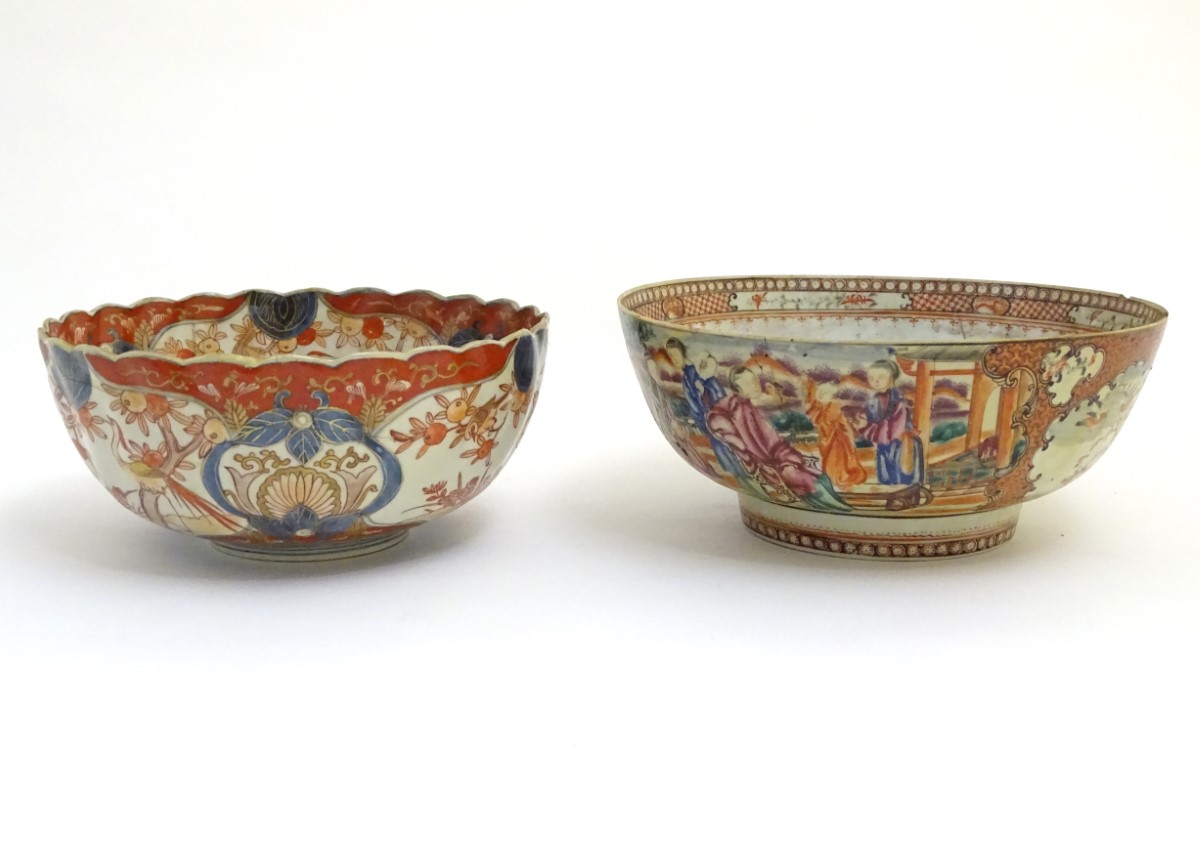 An Imari scalloped-edge bowl with panelled decoration depicting birds and flowers,