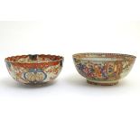 An Imari scalloped-edge bowl with panelled decoration depicting birds and flowers,