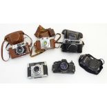 A collection of six vintage 20thC cameras, comprising Agfa 'Selecta M', Praktica 'BC1',