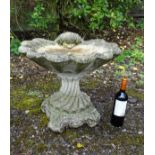 Re-constituted Stone Bird Bath: a pedestal scallop shell bird bath on shaped column.