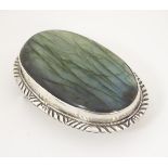 A buckle set with large labradorite cabochon to centre.