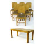 An Art Deco dining table and six matching chairs, of oak construction with light finish.
