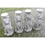 Garden and architectural salvage: A set of four cast composite stone sejant lions / lion supports.