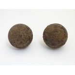 Militaria: a pair of 17thC English Civil War period iron cannonballs,