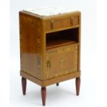 An early / mid 20thC mahogany bedside cabinet with an inset marble top above a single short drawer