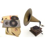 Musical Instruments: Circa 1930's Gramophone player together with a quantity of gramophone records.