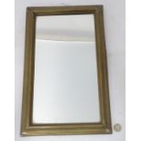 A brass framed rectangular mirror CONDITION: Please Note - we do not make reference