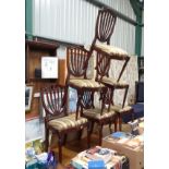 A set of 6 late 20thC/early 20stC Hepplewhite style dining chairs and a twin pedestal extending