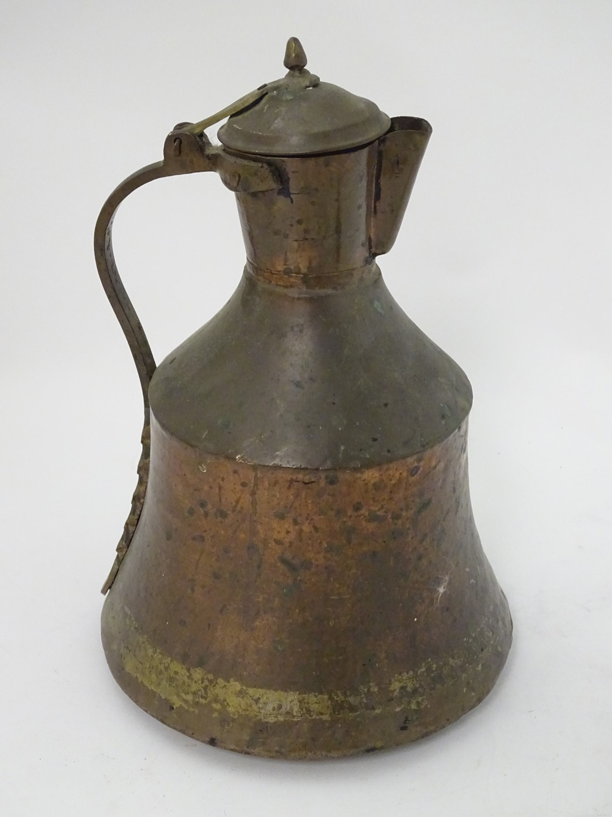 An Ottoman plannished copper and brass handled lidded ewer, - Image 2 of 6