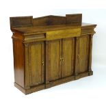 A Victorian mahogany sideboard with a painted up stand above a single long drawer flanked by two
