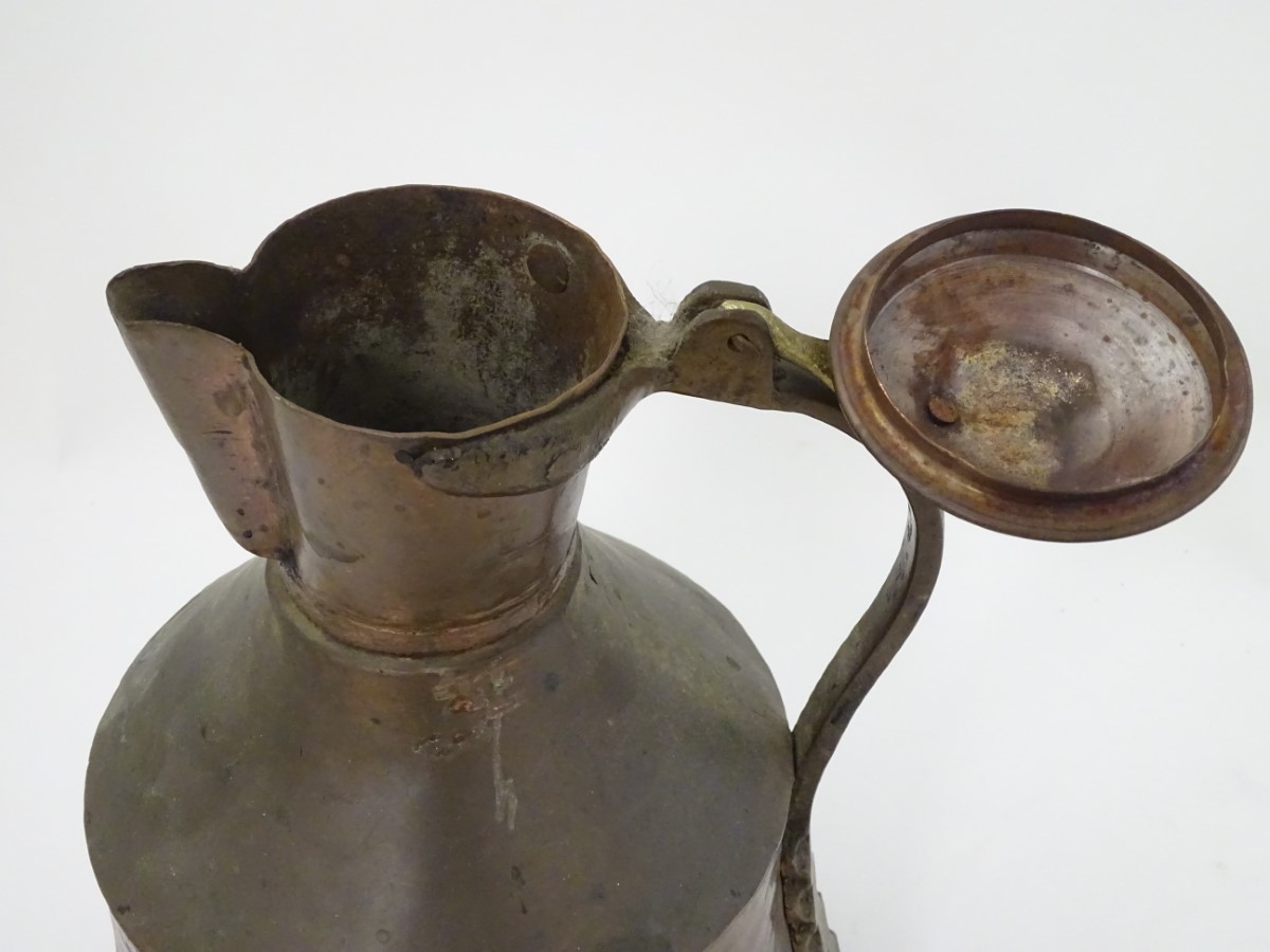 An Ottoman plannished copper and brass handled lidded ewer, - Image 4 of 6